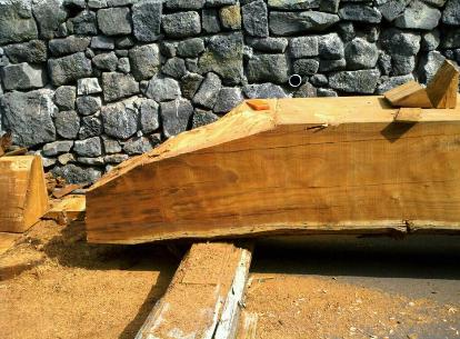 Shaping of koa canoe at Pure Canoes